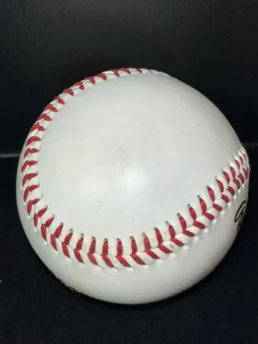 White baseball with red stitching from Halliburton Company Rawlings Houston Astros edition