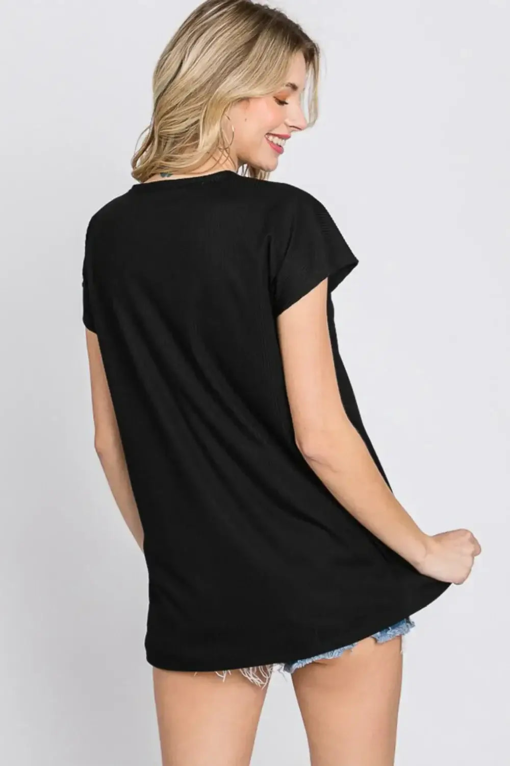 Black oversized short sleeve T-shirt with button V-neck and relaxed fit