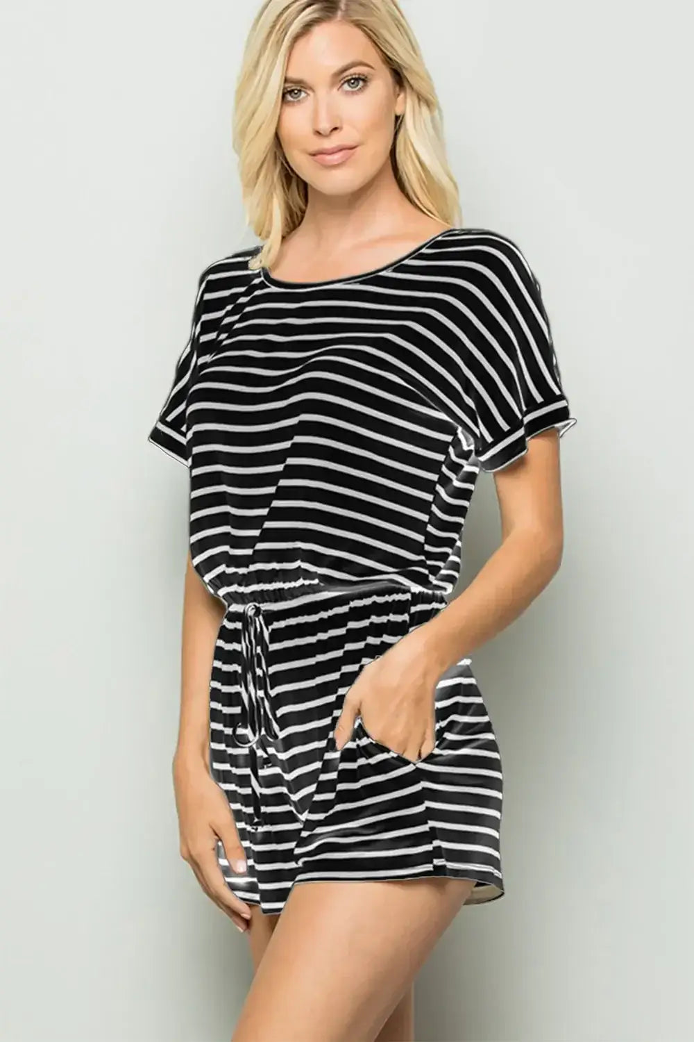 Women’s black and white striped round neck short sleeve romper with pockets and elastic waist