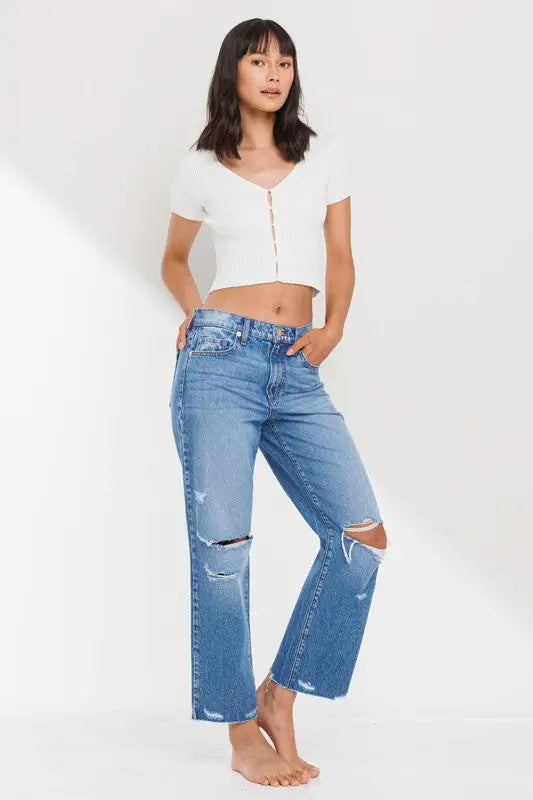 Blue distressed high rise straight leg ankle jeans with ripped knees and raw hem