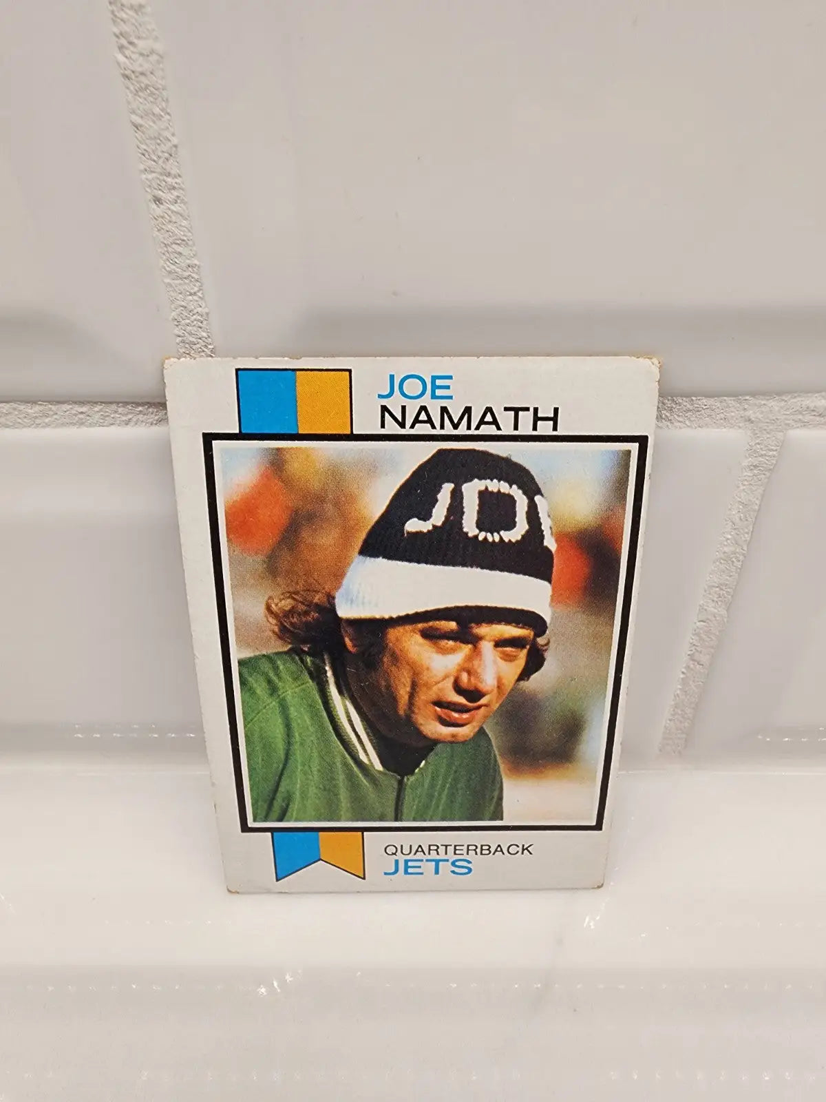 Joe Namath football card from 1973 Topps HOF series featuring New York Jets player