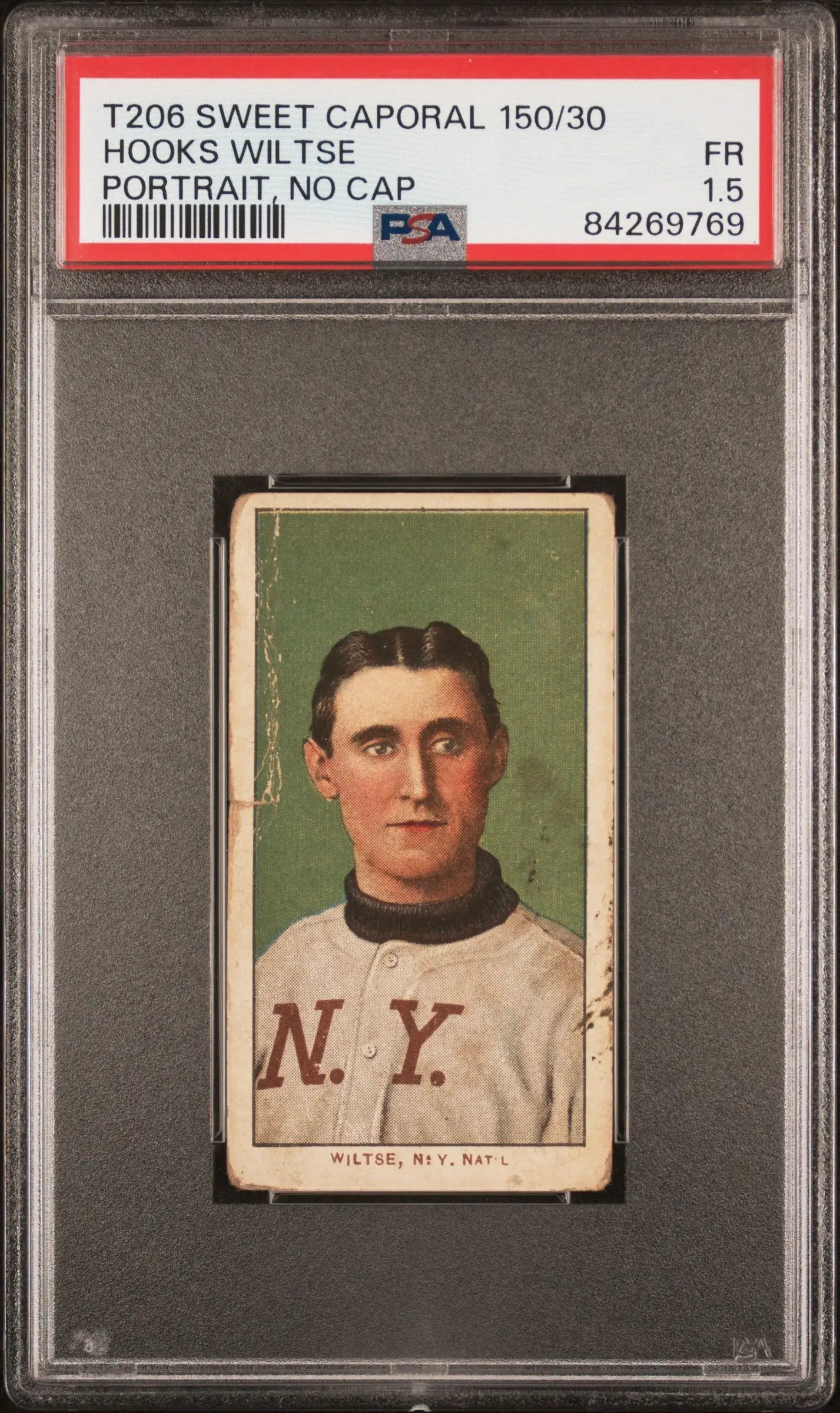 Vintage T206 Sweet Caporal Hooks Wiltse baseball card in PSA 1.5 case with green background