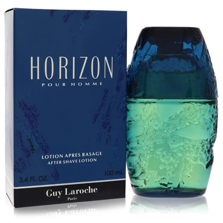 Men’s aftershave lotion in a blue box and textured blue-green bottle by Guy Laroche