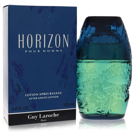 Men’s aftershave lotion in a blue box and textured blue-green bottle by Guy Laroche