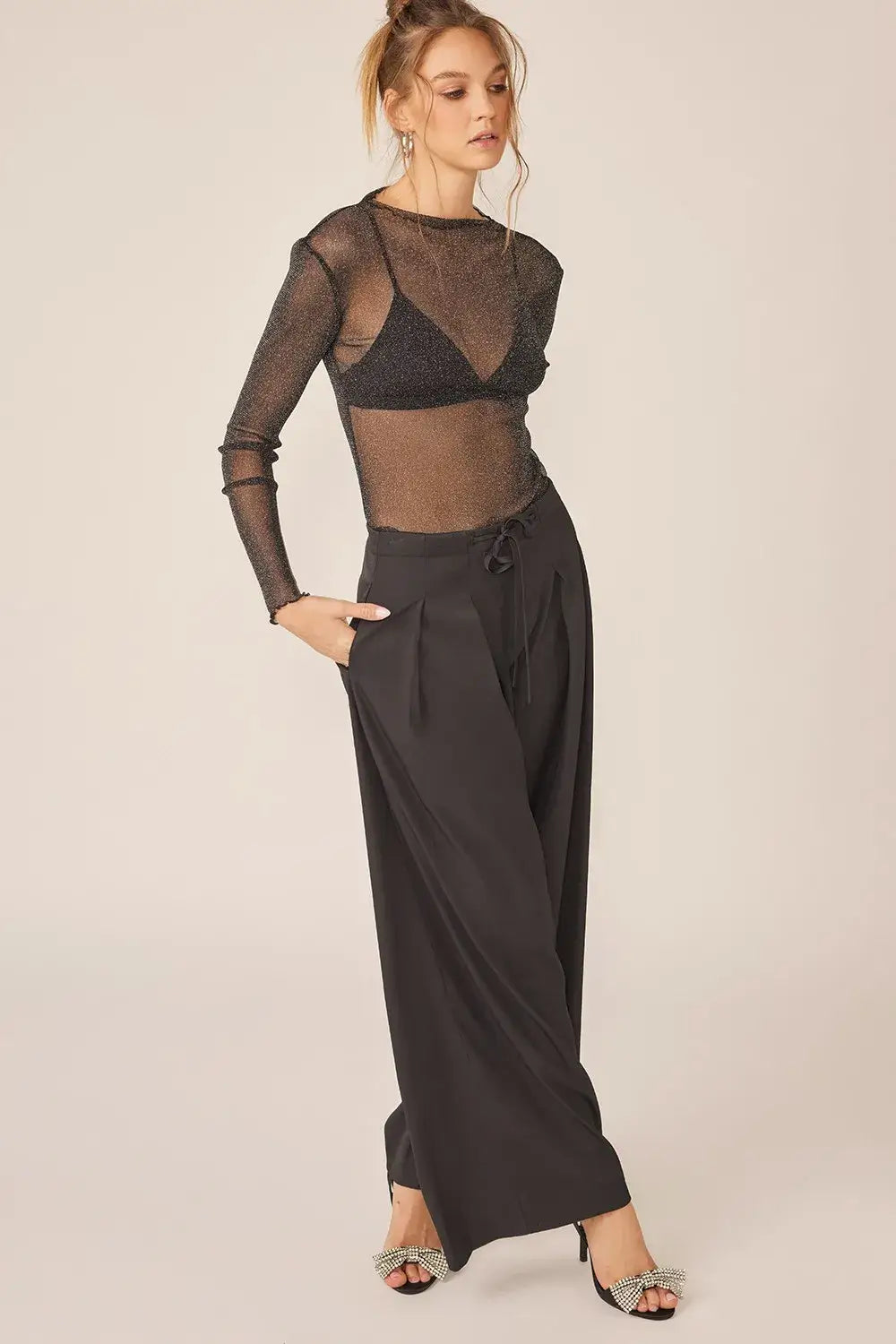 Women’s black sparkling glitter long sleeve sheer top with matching bralette and wide-leg trousers