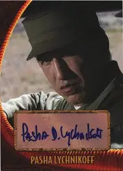 Autographed trading card of Pasha Lychnikoff wearing a dark cap from Indiana Jones