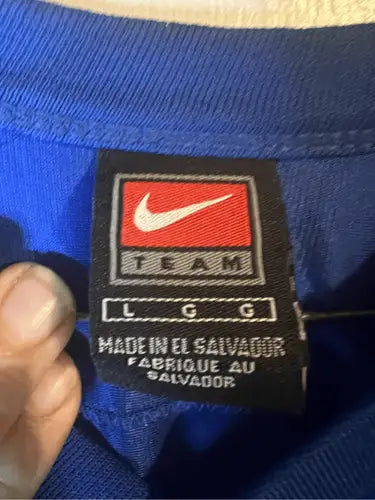 Blue Nike Team shirt tag in size large for Indianapolis Colts Manning jersey made in El Salvador