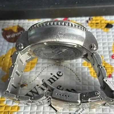 Scratched silver-colored stainless steel NFL Los Angeles Rams men’s watch with blue dial