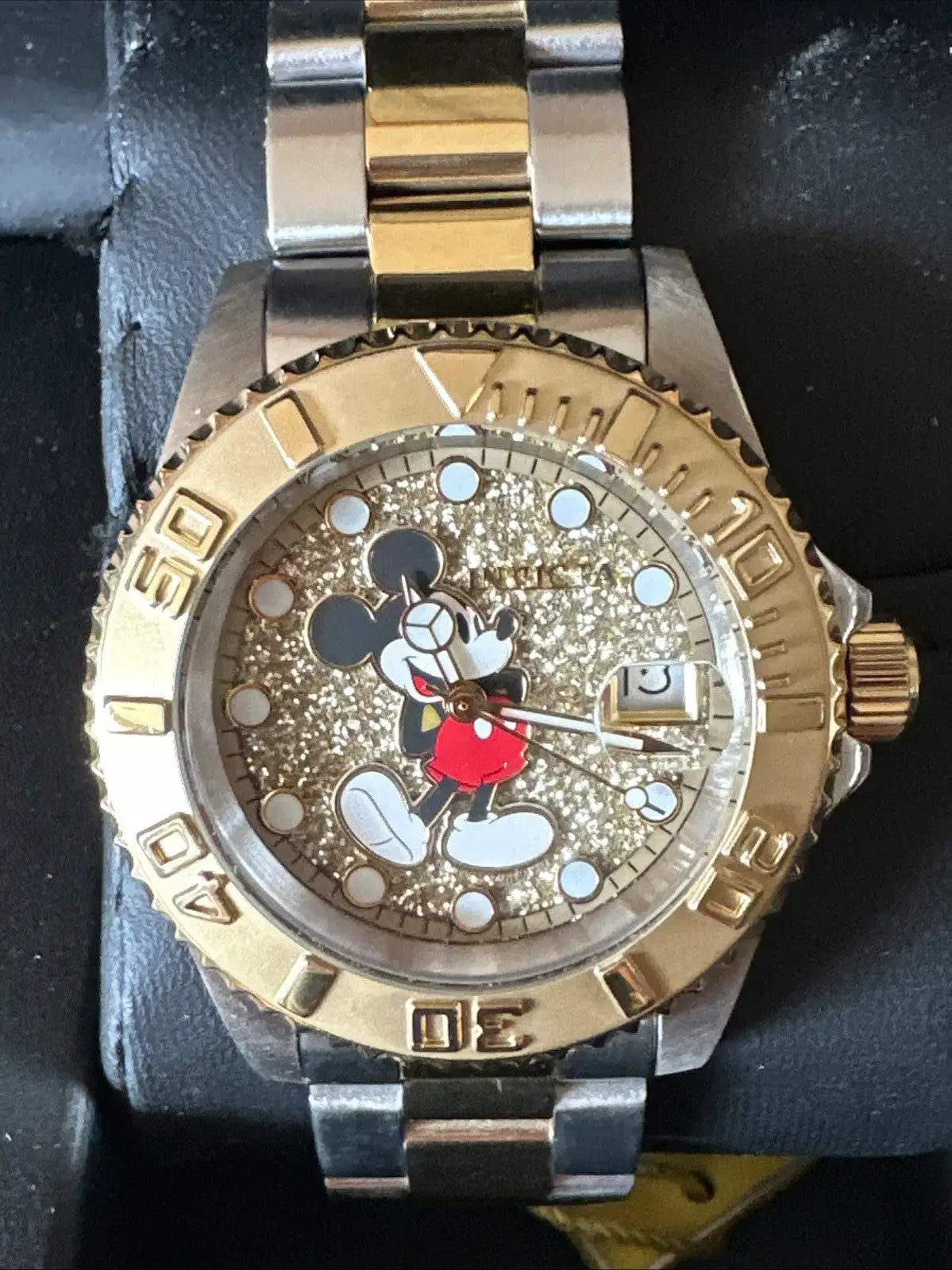 Invicta Limited Edition Women’s Mickey Mouse watch with stainless steel bezel and glitter dial