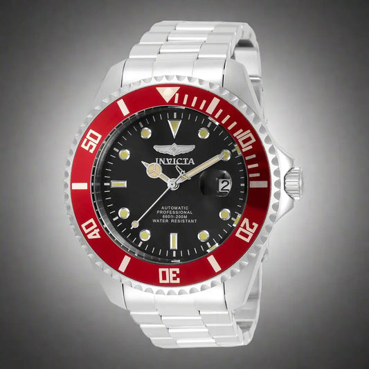 Silver-toned stainless steel Invicta men’s diver’s watch with black dial and red bezel
