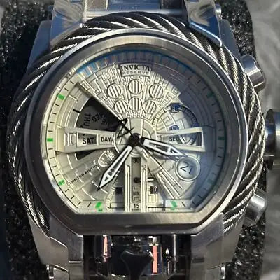 Silver-toned Invicta Reserve chronograph watch with stainless steel bezel and multi-functional dial