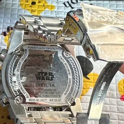 Stainless steel Star Wars Invicta Millennium Falcon chronograph watch with steel bezel