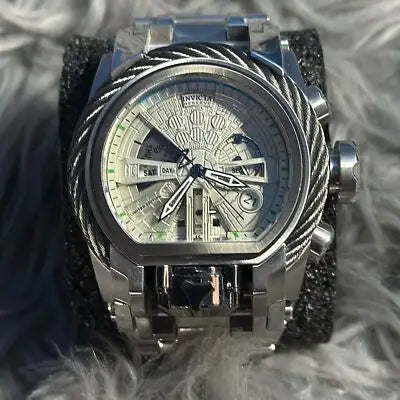 Silver-toned stainless steel watch with intricate dial and cable-wire steel bezel