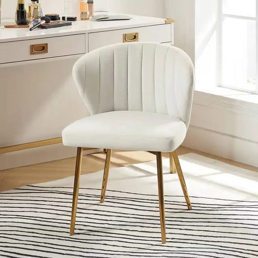 Ivory white velvet upholstered wingback accent chair with gold metal legs and curved backrest