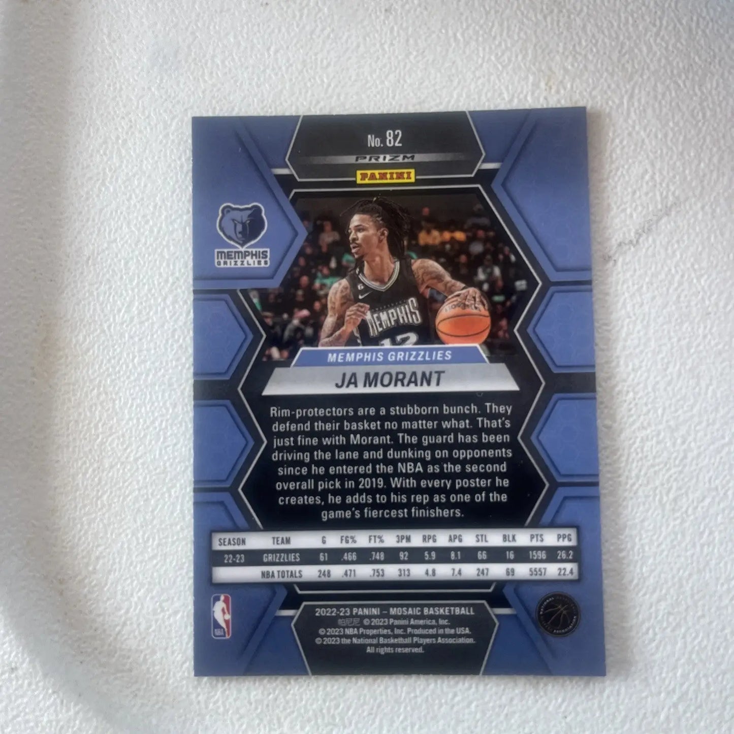 Ja Morant 2022-23 Panini Mosaic Reactive Blue Mosaic Prizm card featuring Grizzlies logo