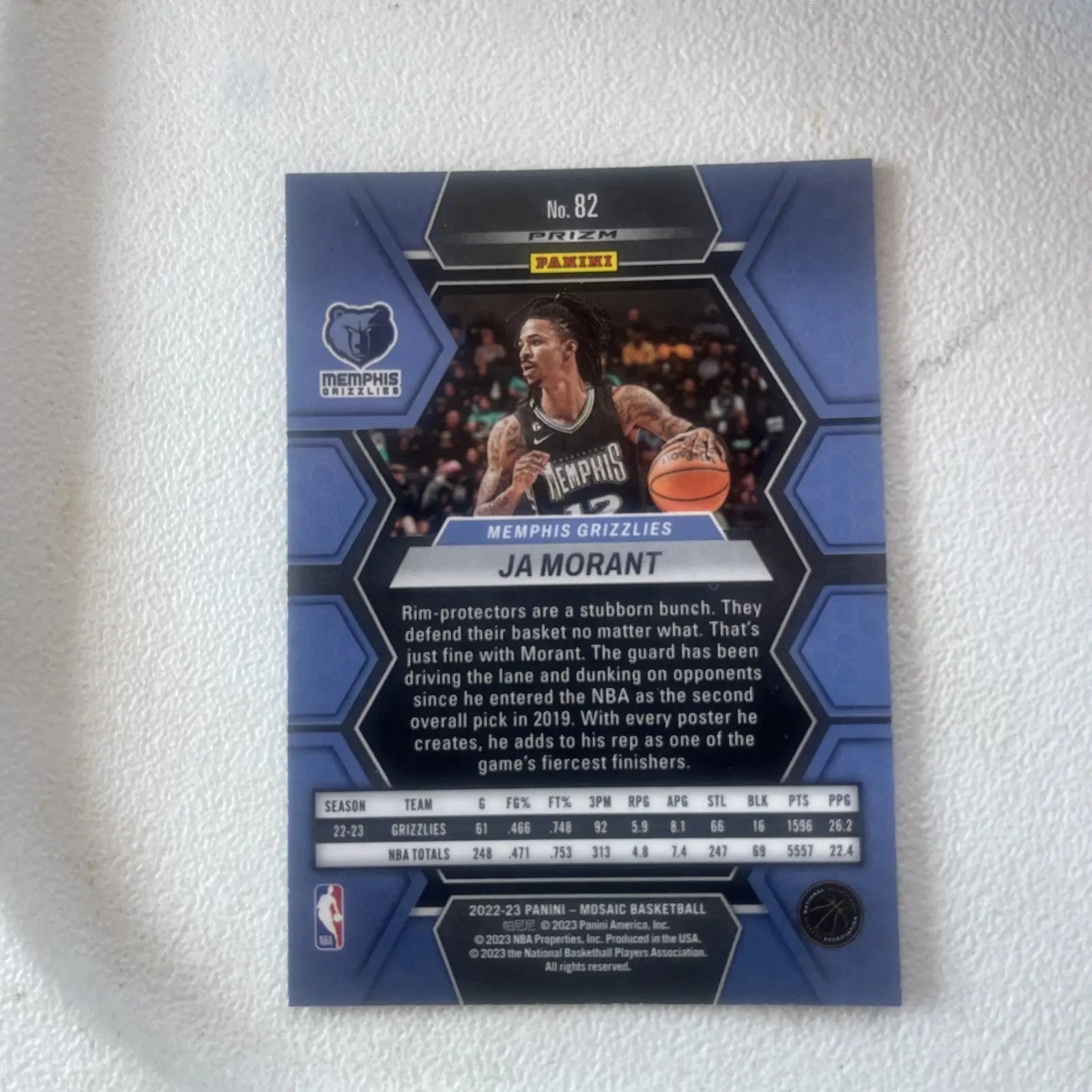 Ja Morant 2022-23 Panini Mosaic Reactive Blue Mosaic Prizm card featuring Grizzlies logo
