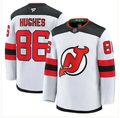 White New Jersey Devils hockey jersey with red and black accents, featuring Jack Hughes design