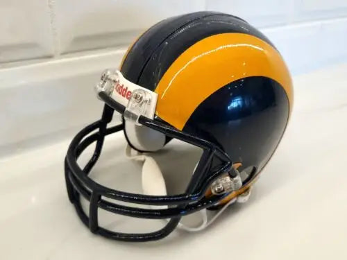 Blue and yellow mini helmet featuring Jack Youngblood with JSA COA insignia