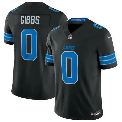 Black Detroit Lions NFL jersey with blue trim and number 0, Jahmyr Gibbs Nike Vapor F.U.S.E. Limited Jersey