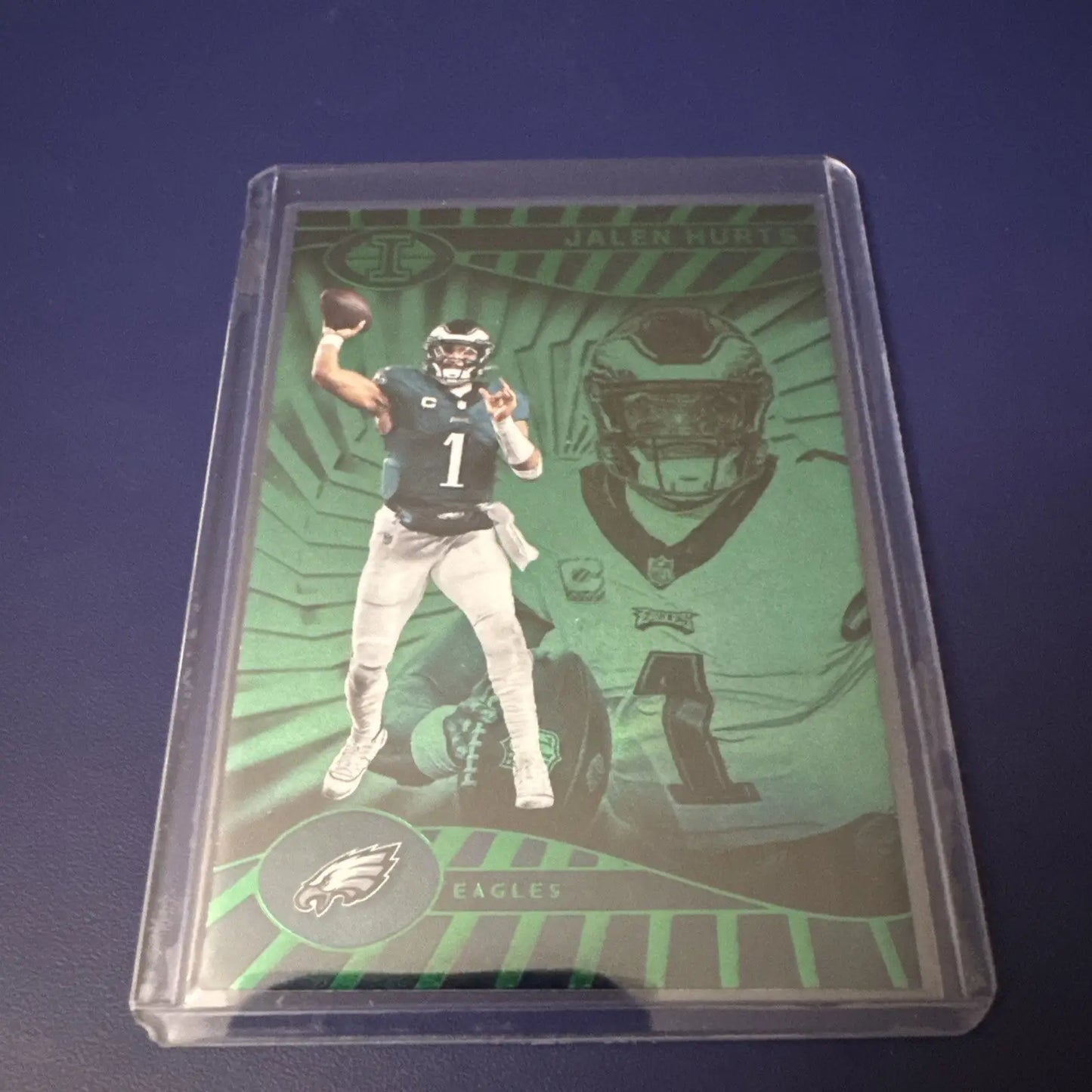 Jalen Hurts Philadelphia Eagles football card in protective sleeve from Panini Illusions Emerald collection