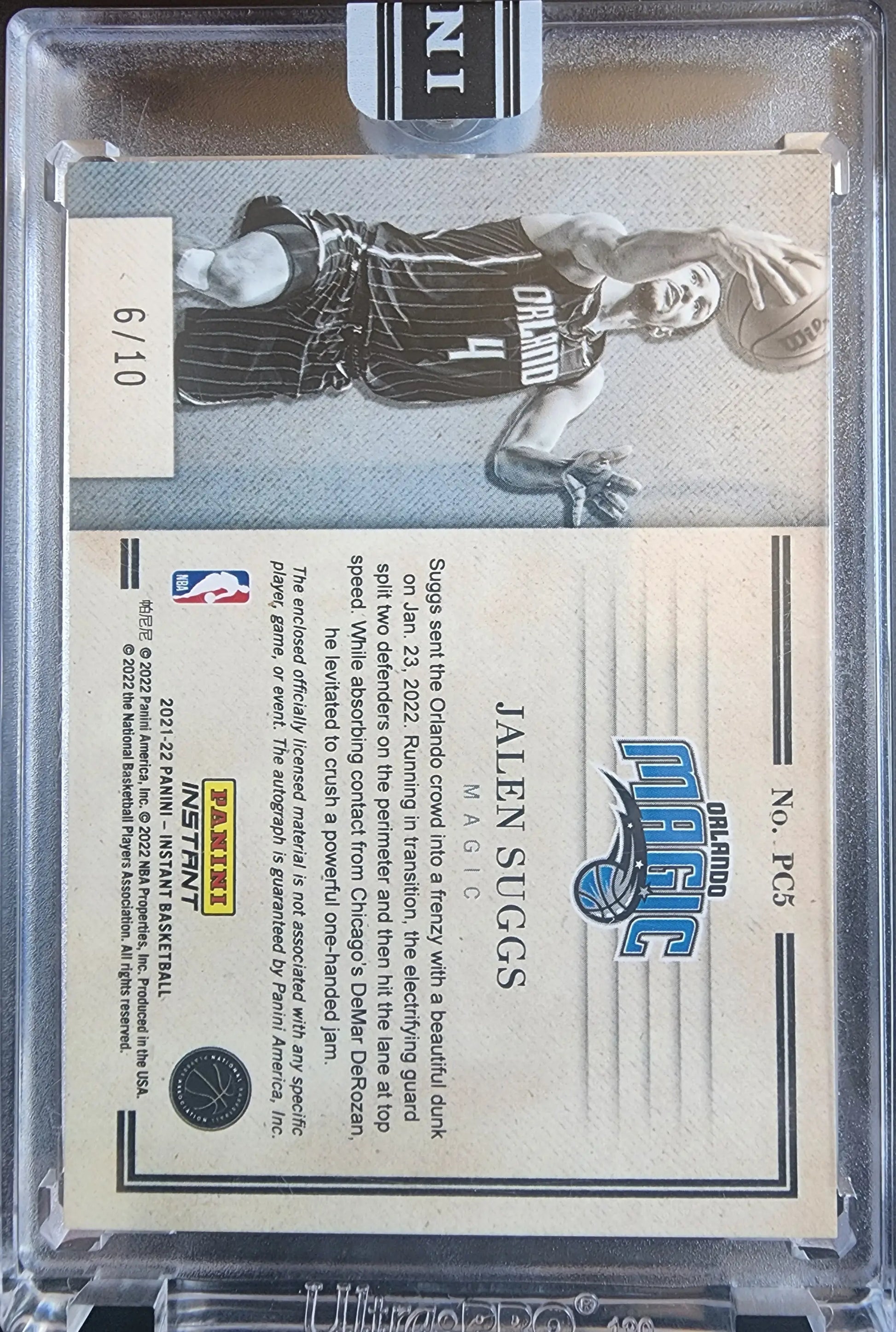 Black and white Jalen Suggs Panini Prime Cuts Jersey Auto trading card in a case