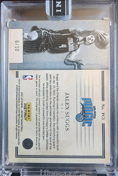 Black and white Jalen Suggs Panini Prime Cuts Jersey Auto trading card in a case