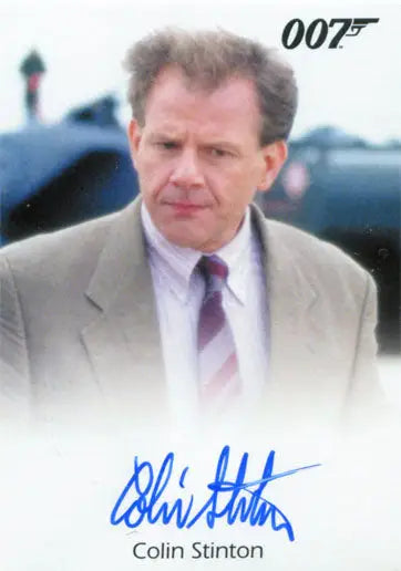 Middle-aged man in suit with serious expression on Colin Stinton Autograph Card