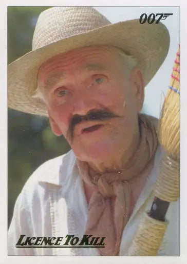Elderly man with mustache in white hat on James Bond 007 gold parallel chase card