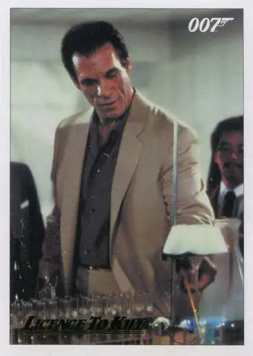 Man in beige suit at bar featured on James Bond 007 chase card gold parallel