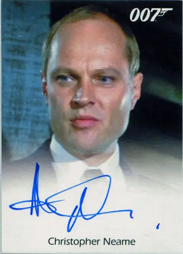 Headshot of Christopher Neame with serious expression on James Bond Archives autograph card