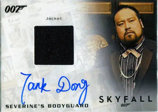 James Bond collectible card with man’s portrait and autograph from Skyfall