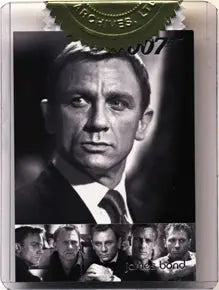 Metallic trading card featuring vintage Bond portrait of Daniel Craig in a suit