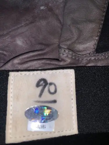 Leather garment tag with number on Jay Ratliff Dallas Cowboys Game Worn Gloves Equipment