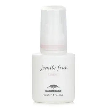 White cylindrical Jemile Fran Oildew hair oil bottle with pump dispenser for hair treatment