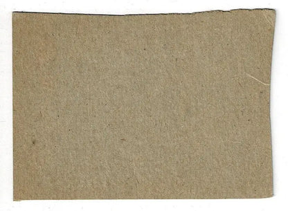 Brown coarse-textured cardboard piece from Jerry Lynch 1962 Post Cereal Reds baseball card
