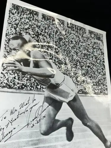 Autographed black and white Jesse Owens photo signed PSA DNA ideal for trading cards collectors