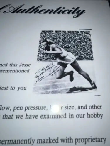 Certificate of authenticity with signed Jesse Owens photo for PSA DNA trading cards