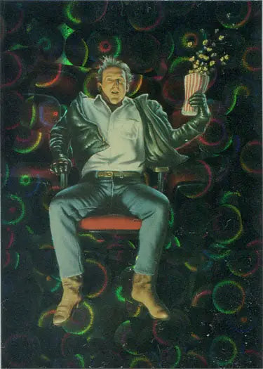 Startled man with popcorn surrounded by colorful shapes on Jim Warren Prism Chase Card