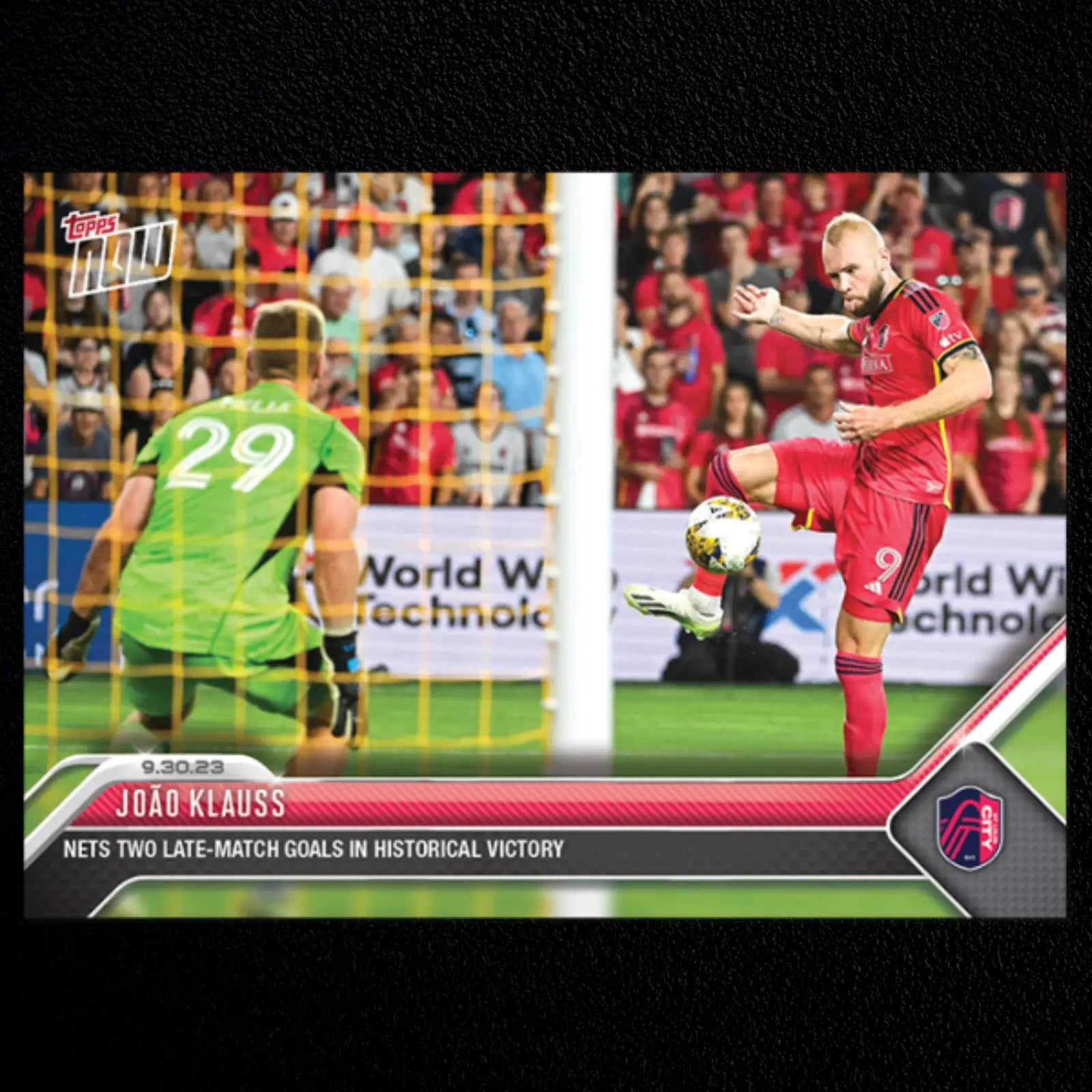 Joao Klauss scores on soccer trading card featuring player kicking ball with goalkeeper in background