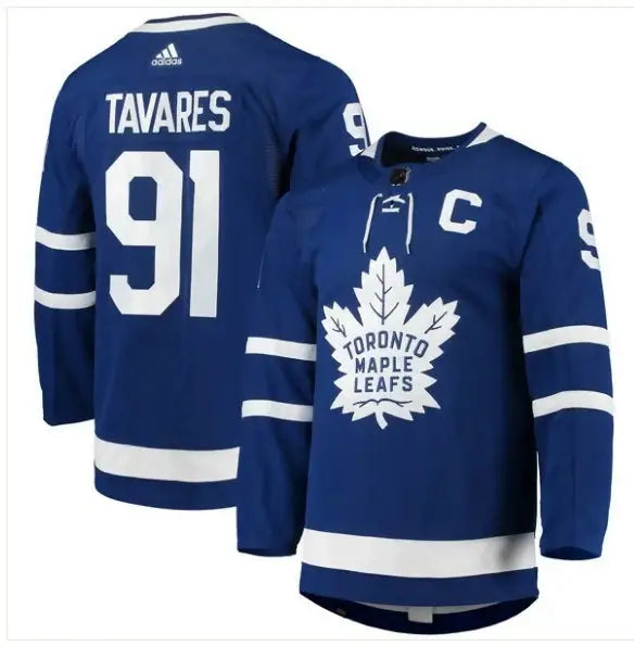 Blue Toronto Maple Leafs John Tavares hockey jersey with captain’s C and player number 91