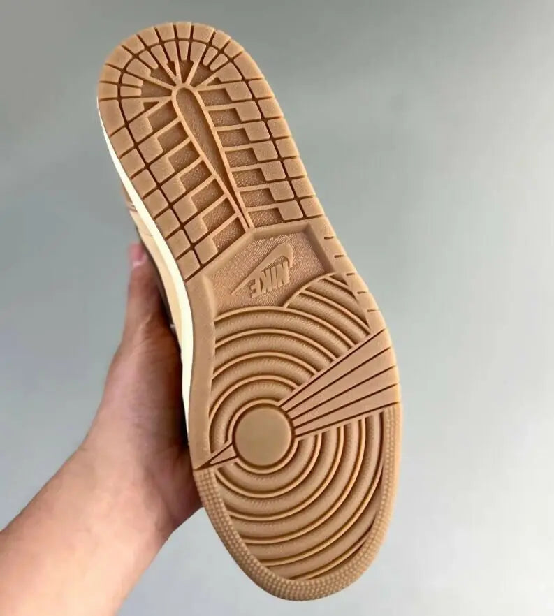 Jordan 1 High Zion Williamson Voodoo sneaker brown rubber sole with textured pattern and Nike logo