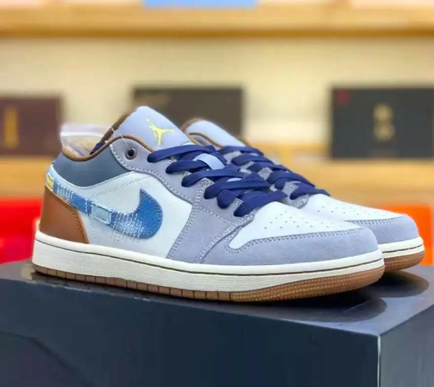 Light blue, white, and brown Jordan 1 Low sneakers with textured Swoosh and fast shipping