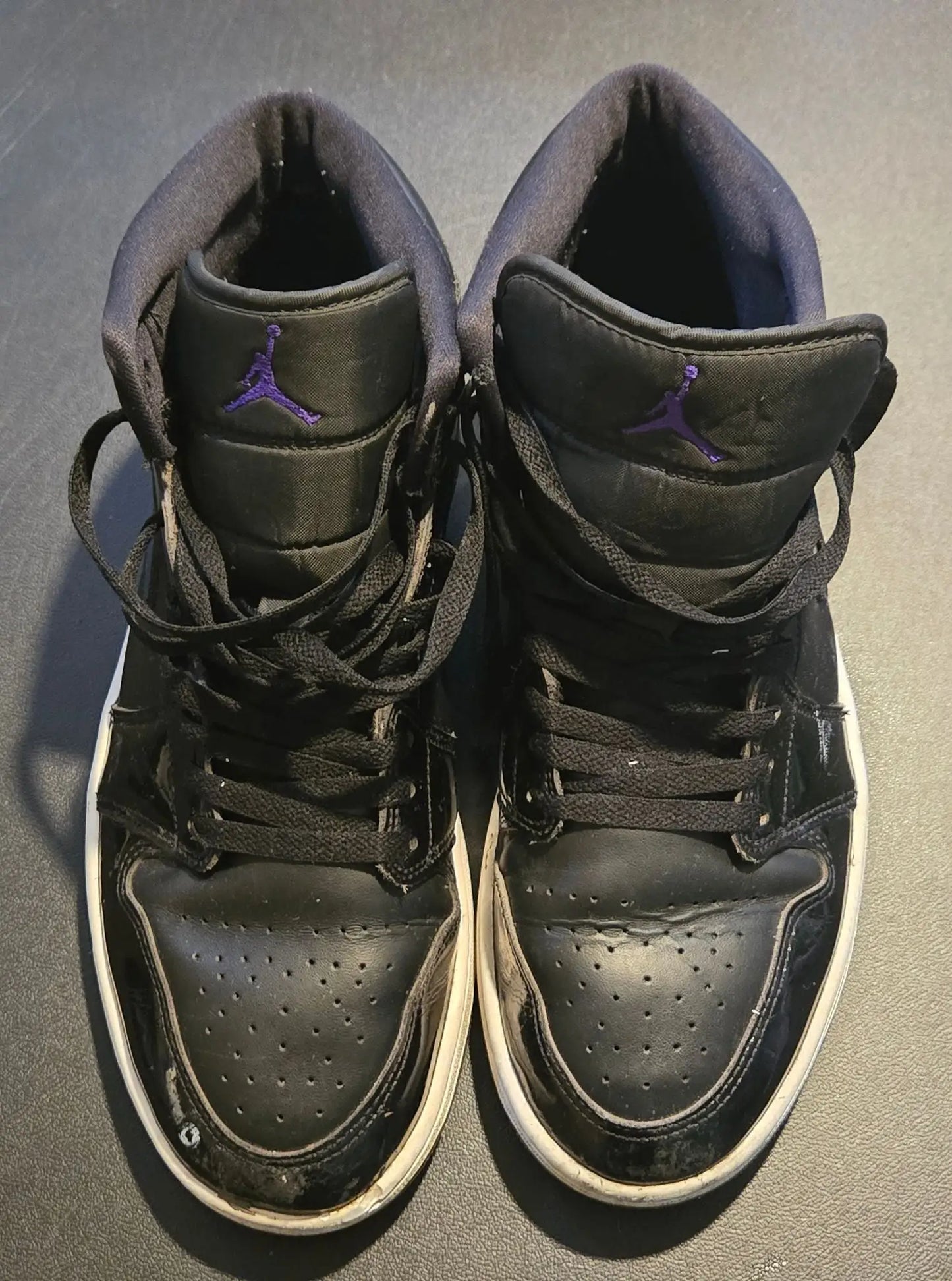 Black patent high Jordan shoes mens with white soles and purple Jumpman logos