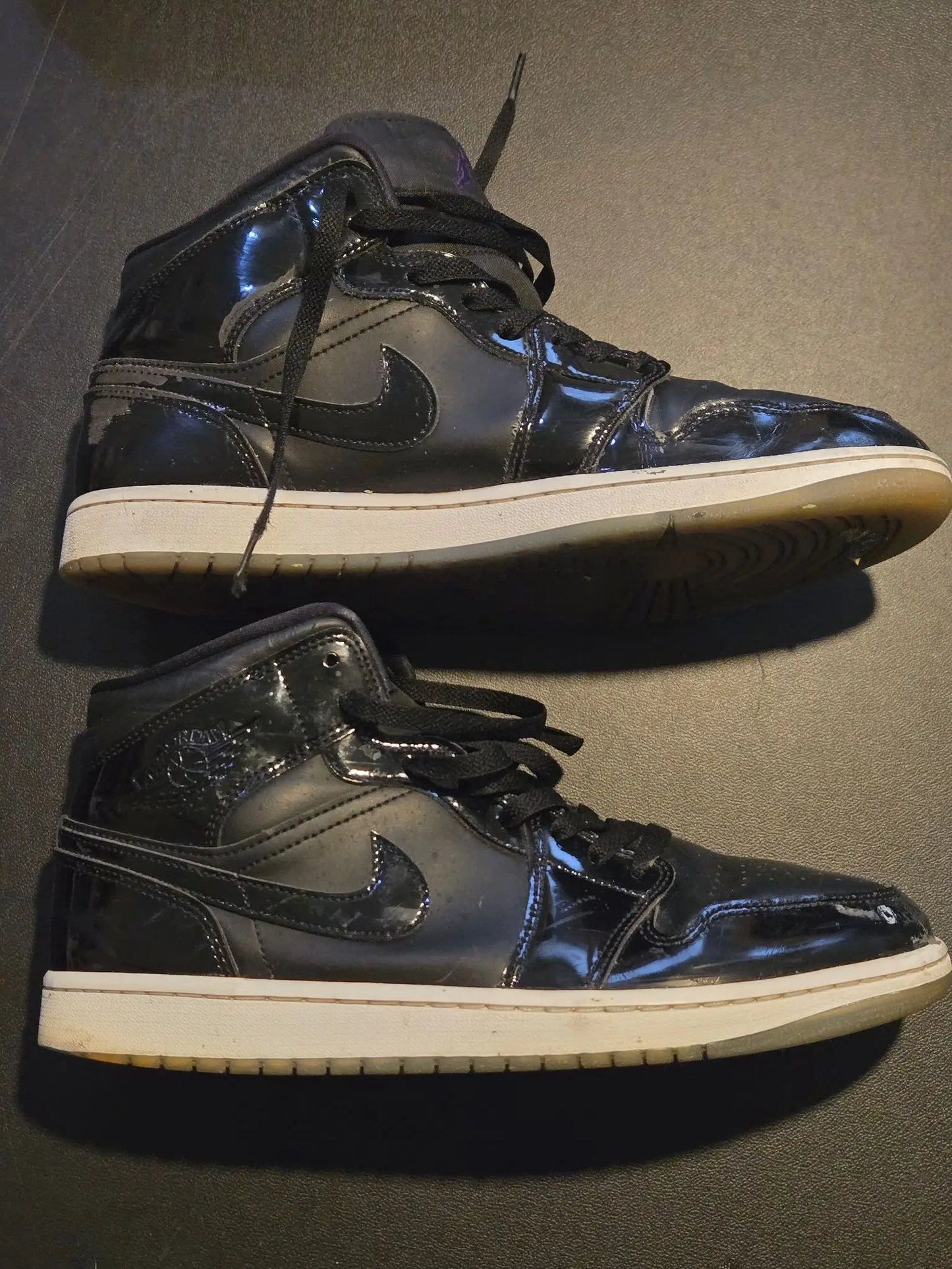 Well-worn Jordan shoes mens black patent high top Air Jordan 1 sneakers with white midsoles
