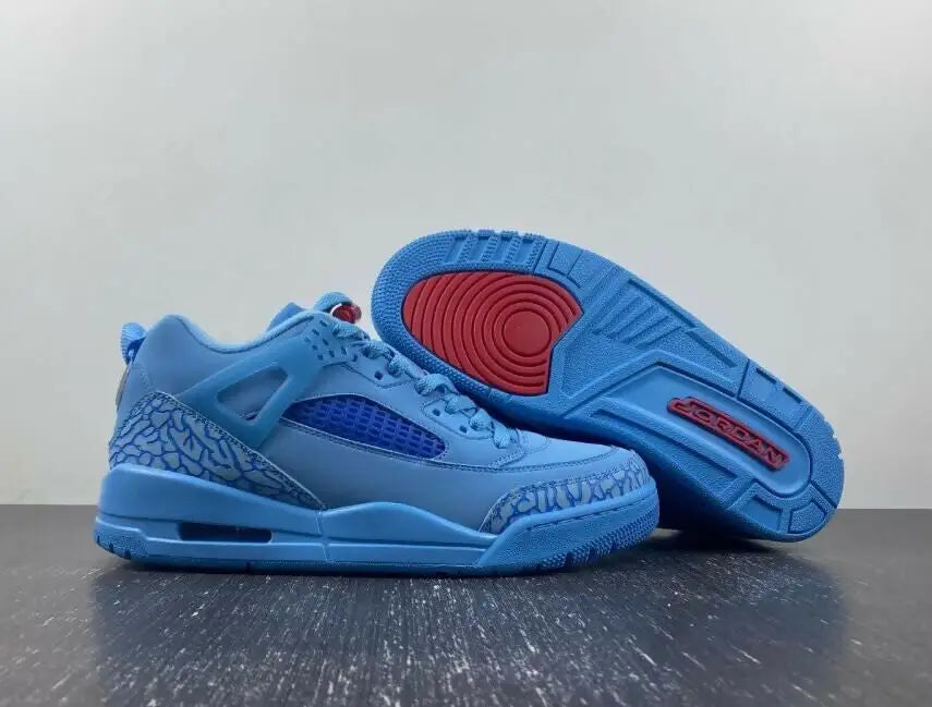 Light blue Jordan Spizike Low Houston Oilers athletic shoes with red accents for fast shipping