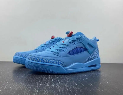 Light blue Jordan Spizike Low Houston Oilers athletic shoes with elephant print accents, fast shipping