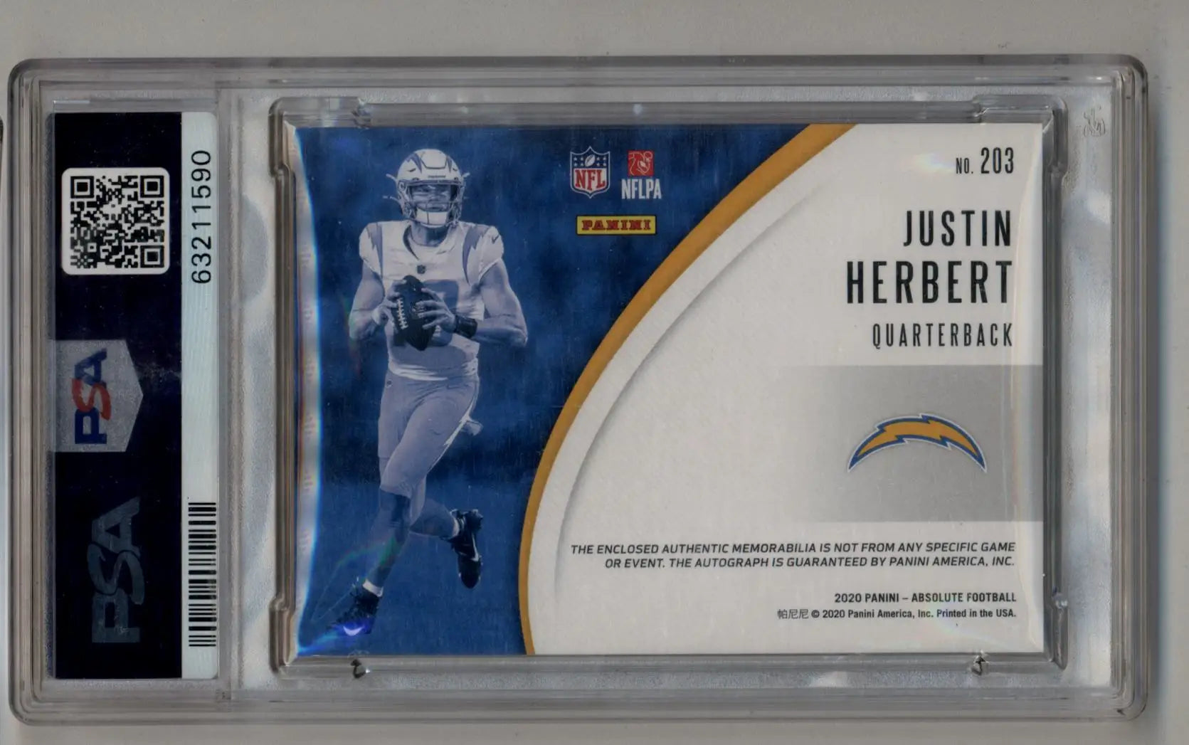 NFL trading card in protective case featuring Justin Herbert Absolute Materials Auto Spectrum