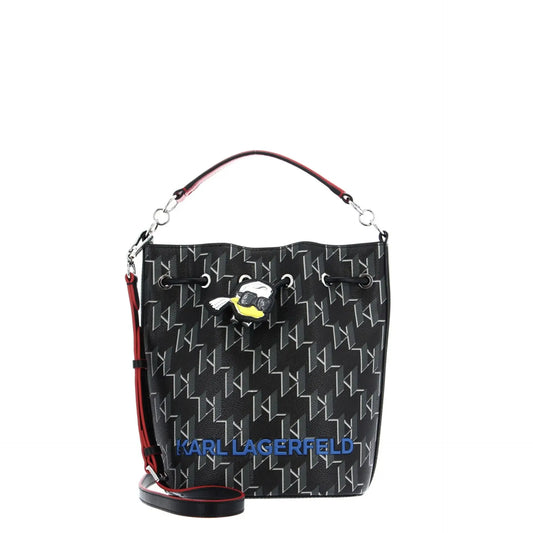 Black Karl Lagerfeld bucket bag with white KL monogram print, cartoon charm, and red accents featuring shoulder strap