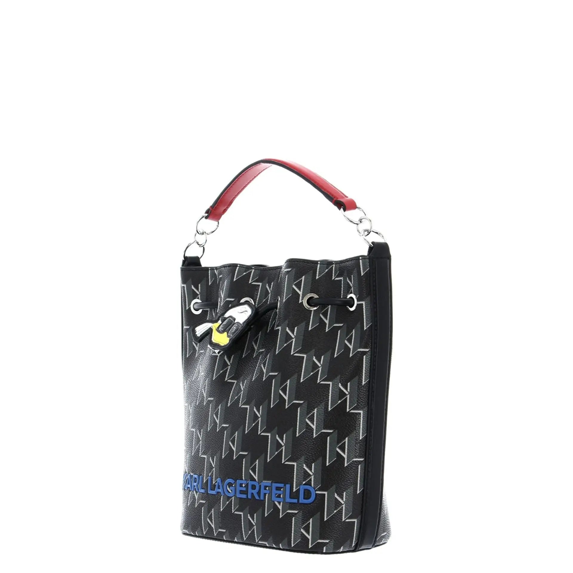 Black Karl Lagerfeld bucket bag with white geometric pattern, red handle, and cartoon charm