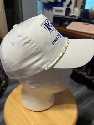 White Keesler Federal Credit Union Cobra SnapBack Hat on mannequin head